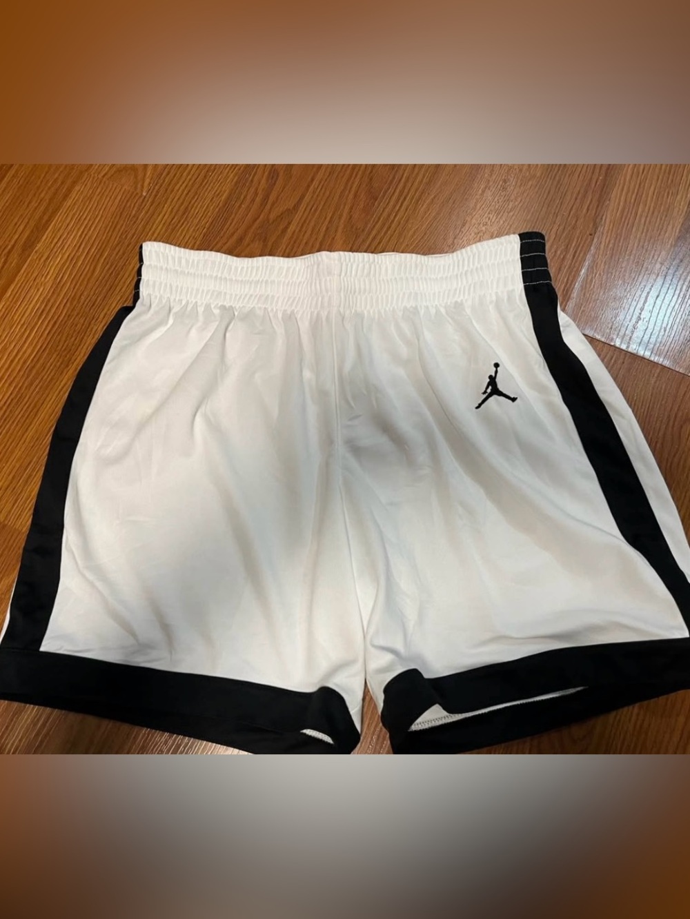 Women’s Nike White Athletic Shorts with Black Jumpman Accent